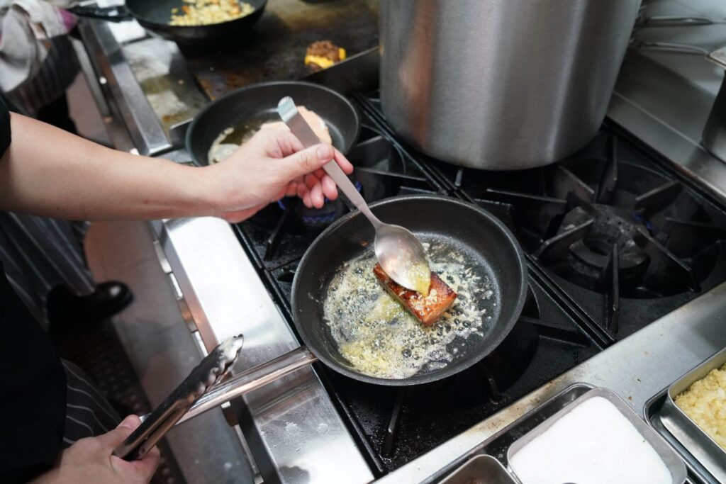 Cooking in our kitchen